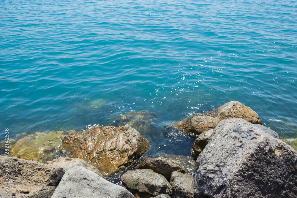 View of the blue water of the Black sea and coastal cliffs on the coast
