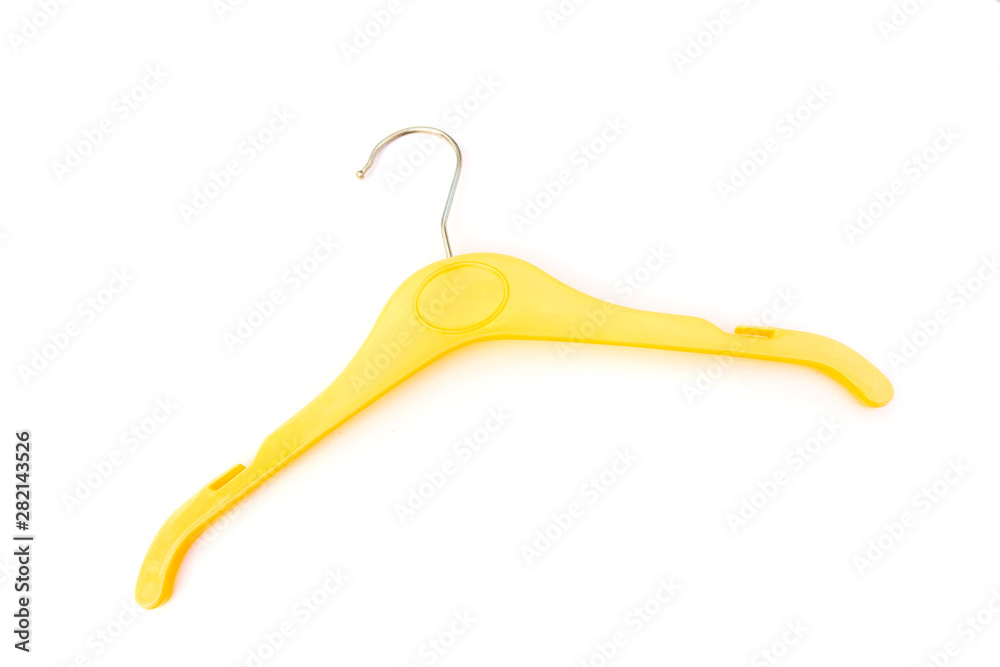 yellow plastic hanger isolated on white background. yellow plastic hanger isolated on white background.