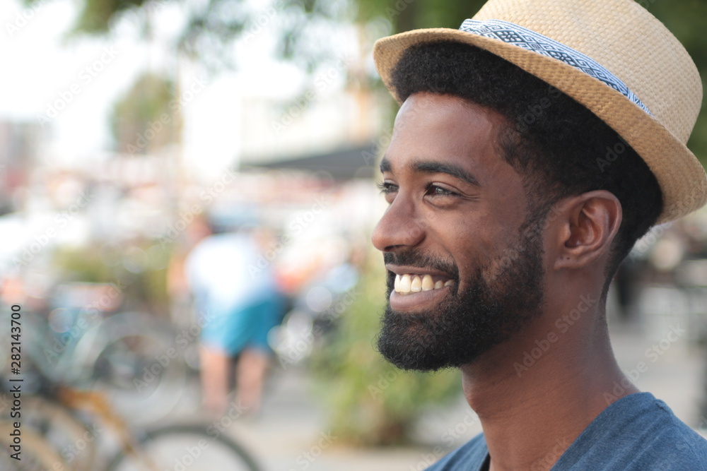 Beautiful happy man outside in the park Beautiful happy man outside in the park