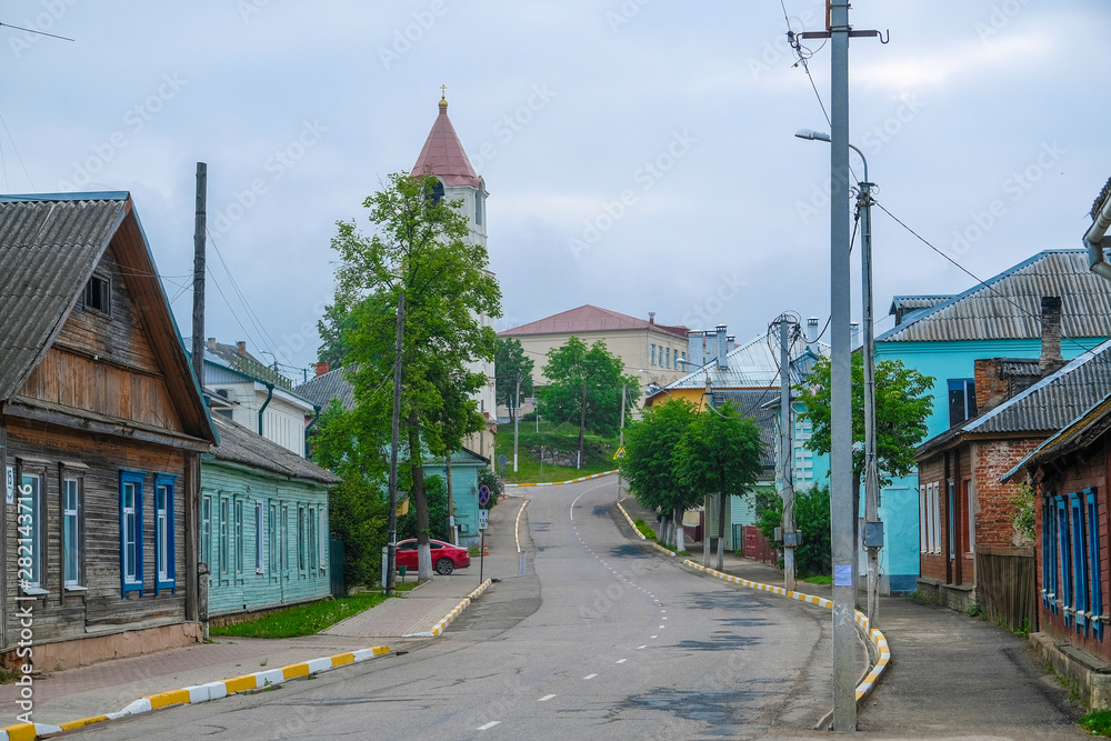 Obraz premium Sebezh, Russia - May, 25, 2019: Image of rural houses along the road in the city of Sebezh, Russia