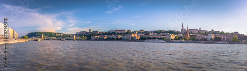 Fotografie, Obraz Budapest - June 21, 2019: Panoramic view of the Danube in Budapest, Hungary
