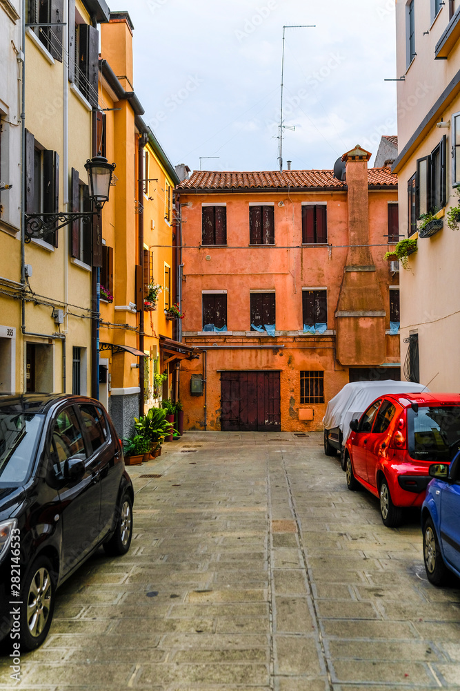 Sotomarina, Italy - July, 11, 2019: cars on a parking in a center of  Sotomarina, Italy