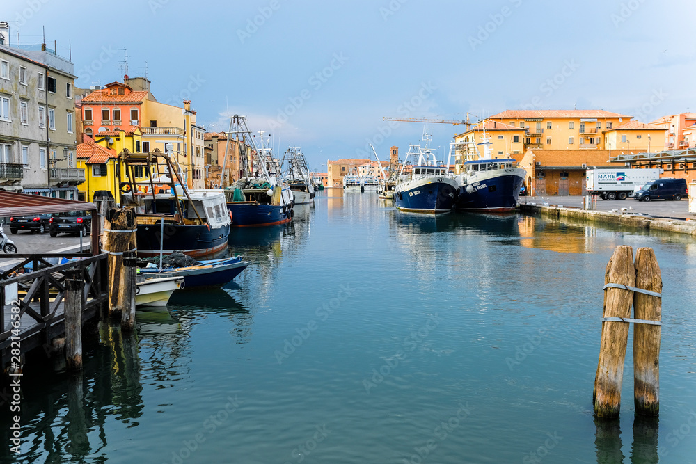 Sottomarina, Italy - July, 07, 2019: cityscape with the image of channel in Sottomarina, Italy, the small town near Venice