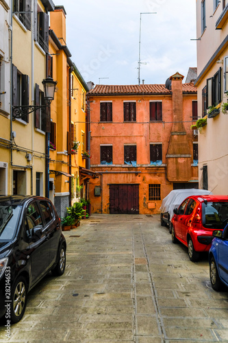 Sotomarina, Italy - July, 11, 2019: cars on a parking in a center of  Sotomarina, Italy photo
