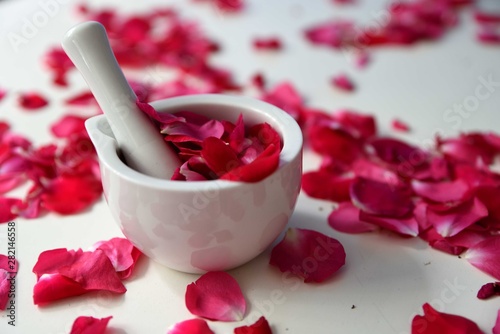 Mortar and pestle with rose petals
