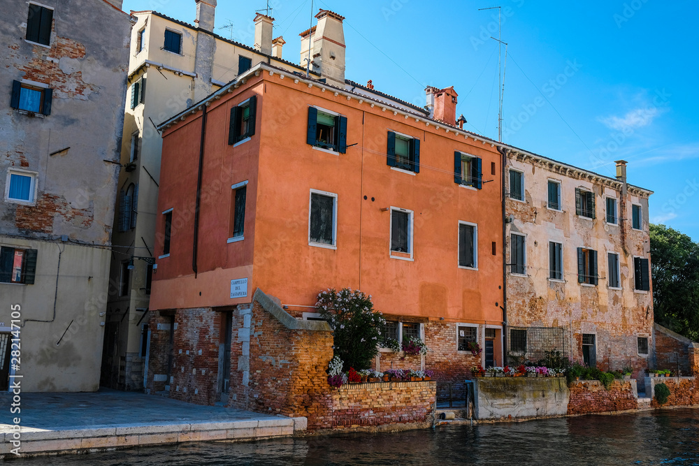 Venice, Italy - July, 07, 2019: cityscape with the image of channel in Venice, Italy