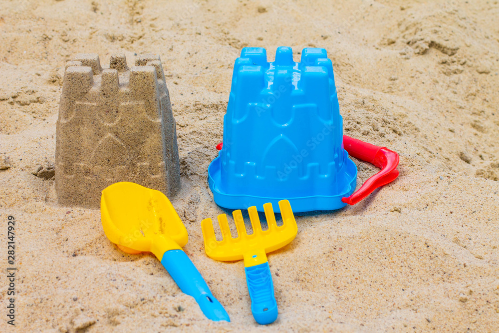baby toy in the sand baby toy in the sand