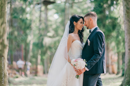 Beautiful wedding couple outdoor portrait.