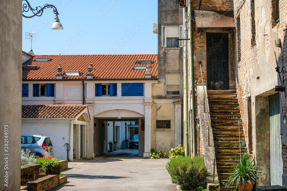 Obraz premium Esye, Italy - July, 11, 2019: yard of a dwelling house in Este, Italy
