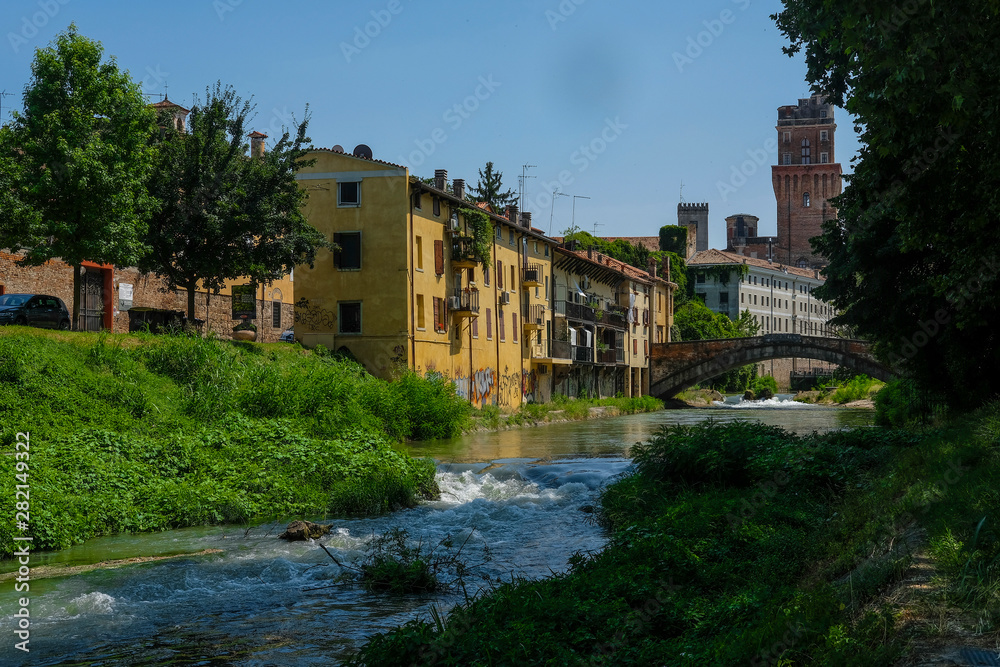 Obraz premium Padova, Italy - Jujy, 4, 2019: embankment of a channel in Padova, Italy