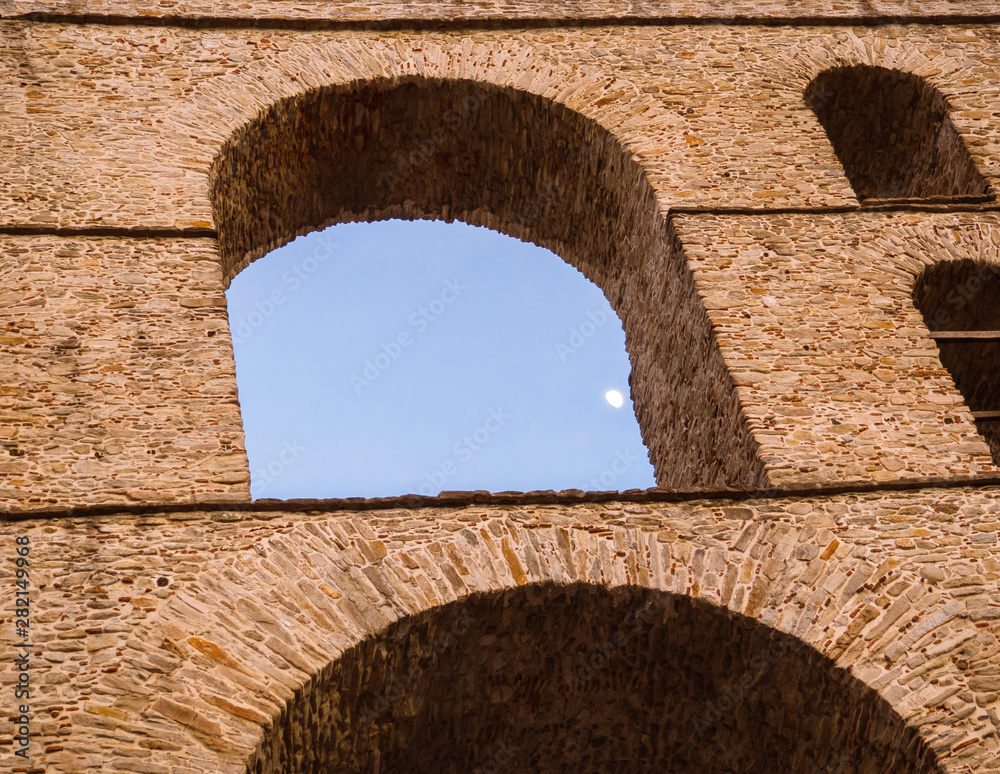 Detail of arcs and brickwork of stunning architecture - Ancient Roman aqueduct in Greece
