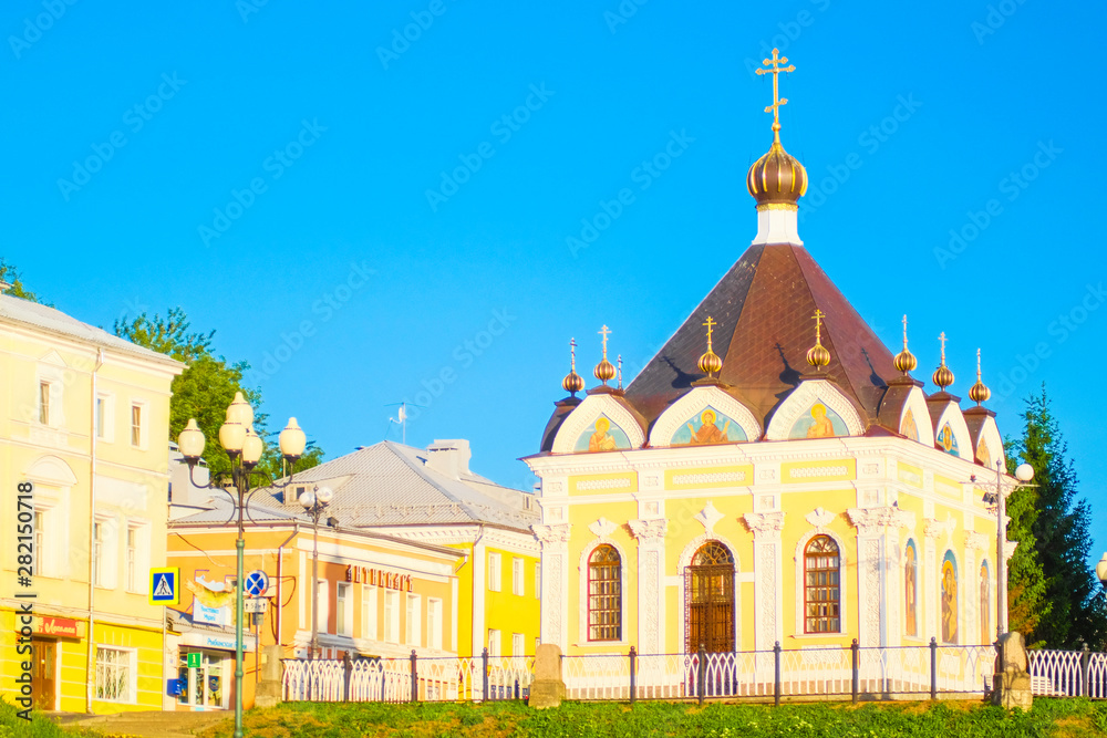 Rybinsk, Russia - June, 10, 2019: small church on Volga embankment in Rybinsk, Russia at sunrise