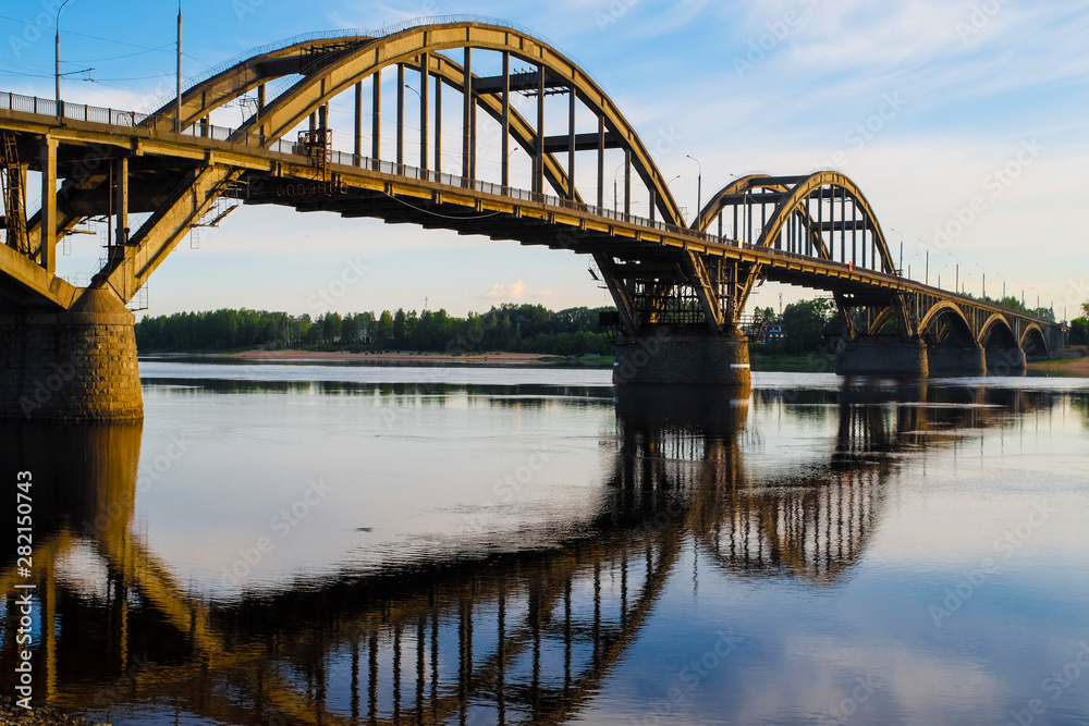 Bridge over Volga in Rybinsk, Russia at sunrise Bridge over Volga in Rybinsk, Russia at sunrise