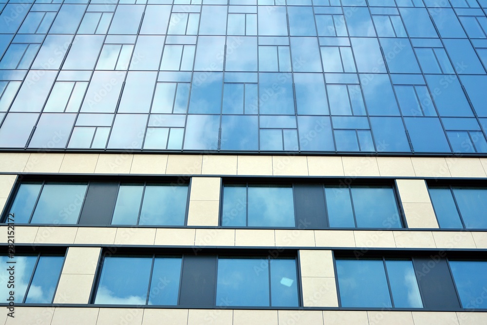 modern building with blue sky and clouds