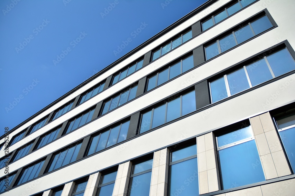modern building with blue sky and clouds modern building with blue sky and clouds
