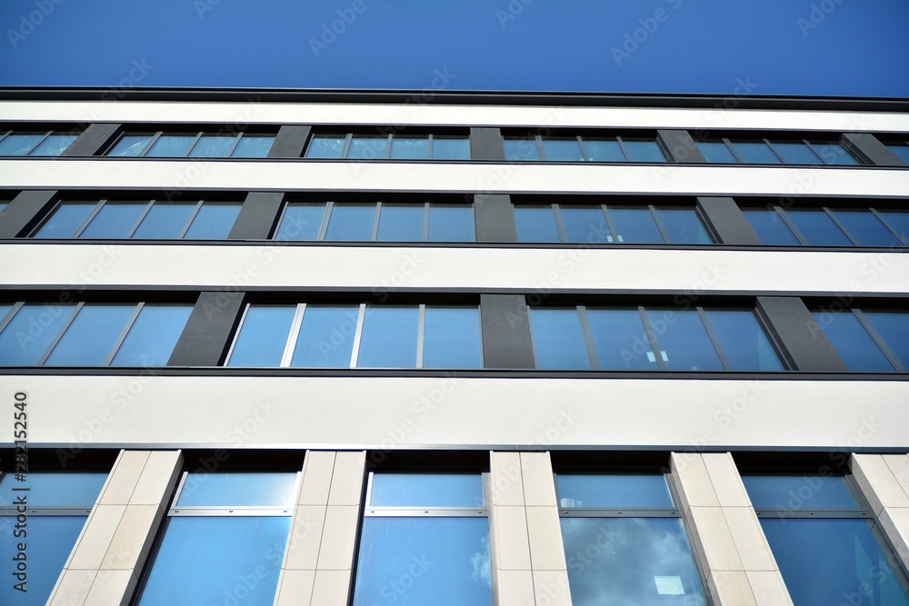 modern building with blue sky and clouds modern building with blue sky and clouds