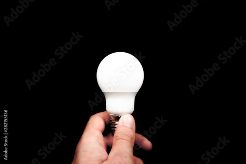 Brainstorming bulb creative idea abstract icon in business hand. photo