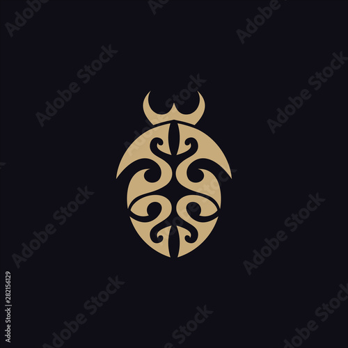 beetle with tribal tattoo logo vector design template