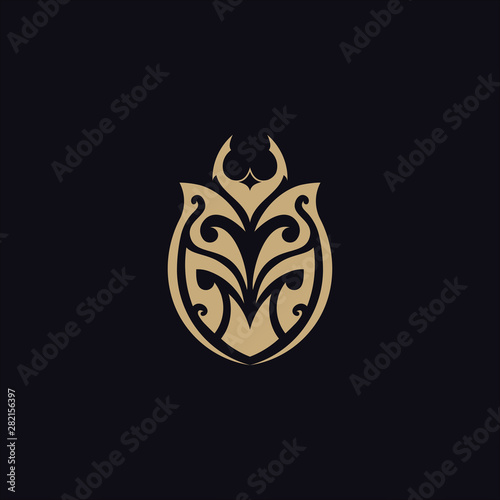 beetle with tribal tattoo logo vector design template
