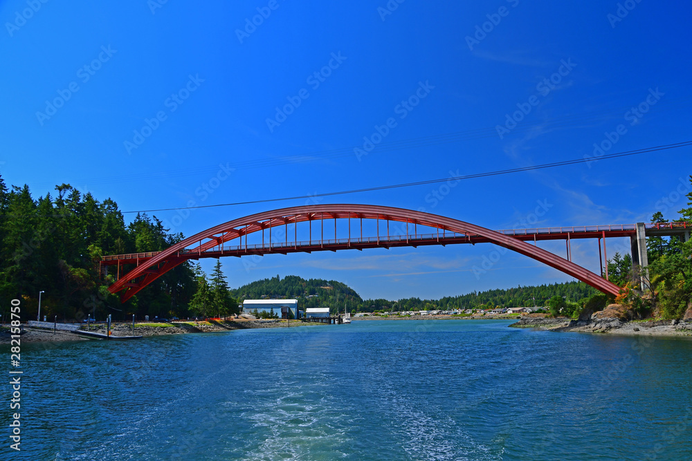 The Rainbow Bridge spanning the Swinomish Channel in La Conner, Washington The Rainbow Bridge spanning the Swinomish Channel in La Conner, Washington