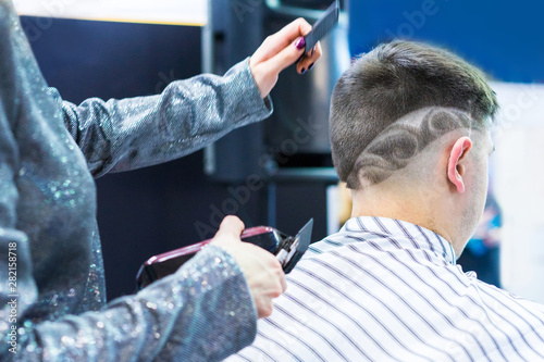 Barbershop. Shaving the pat...