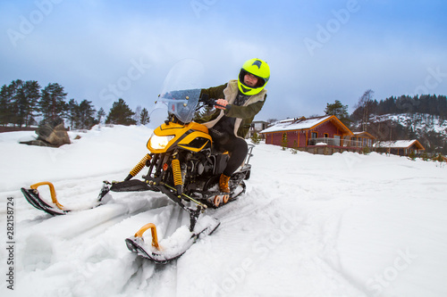 Snowmobiling. Winter entert...