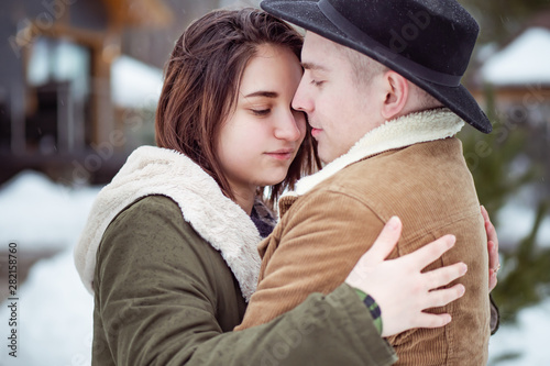 Guy and girl hugging. The m...