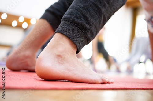 feet on a yoga mat