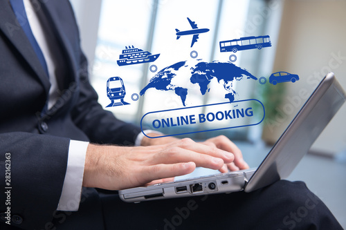 Concept of online booking for trip photo