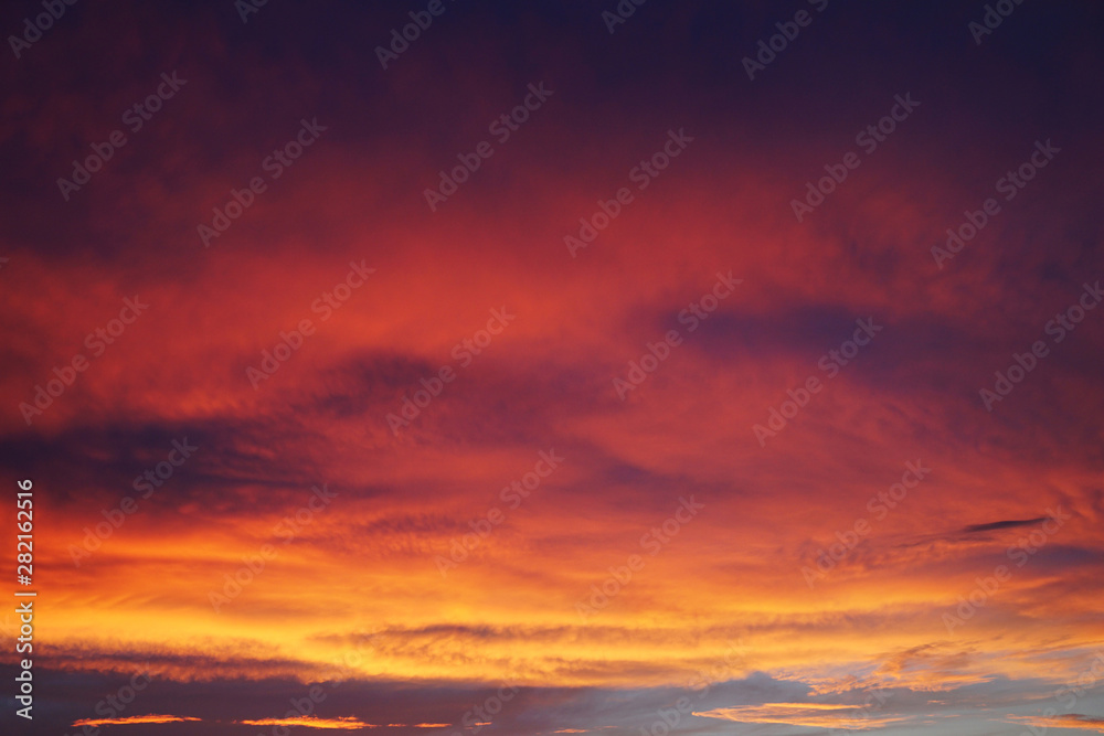 Bright colorful sunset with Pink and Purple Clouds