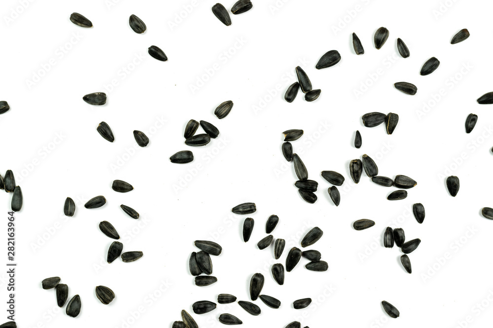 Sunflower seeds, background or texture isolated on white. lose-up. Sunflower seeds, background or texture isolated on white. lose-up.