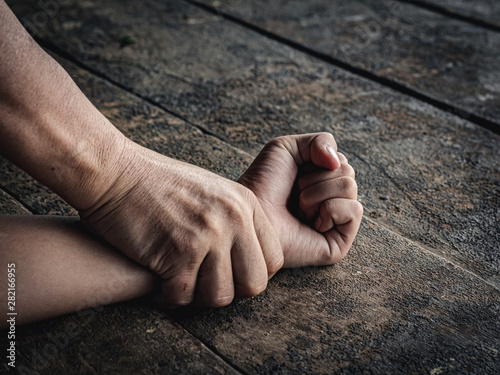 Valokuvatapetti Hands for rape and sexual abuse concept