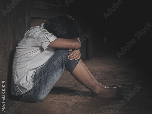 young homeless despair traumatized young girl photo