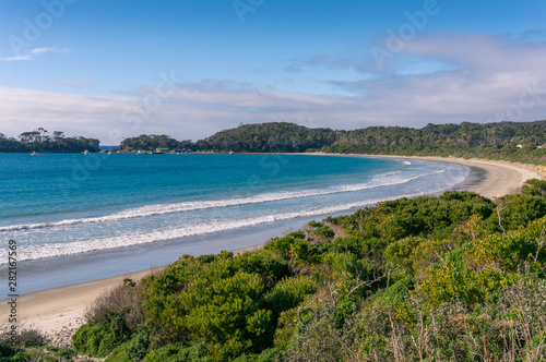 Picturesque bay with sandy beach on sunny day