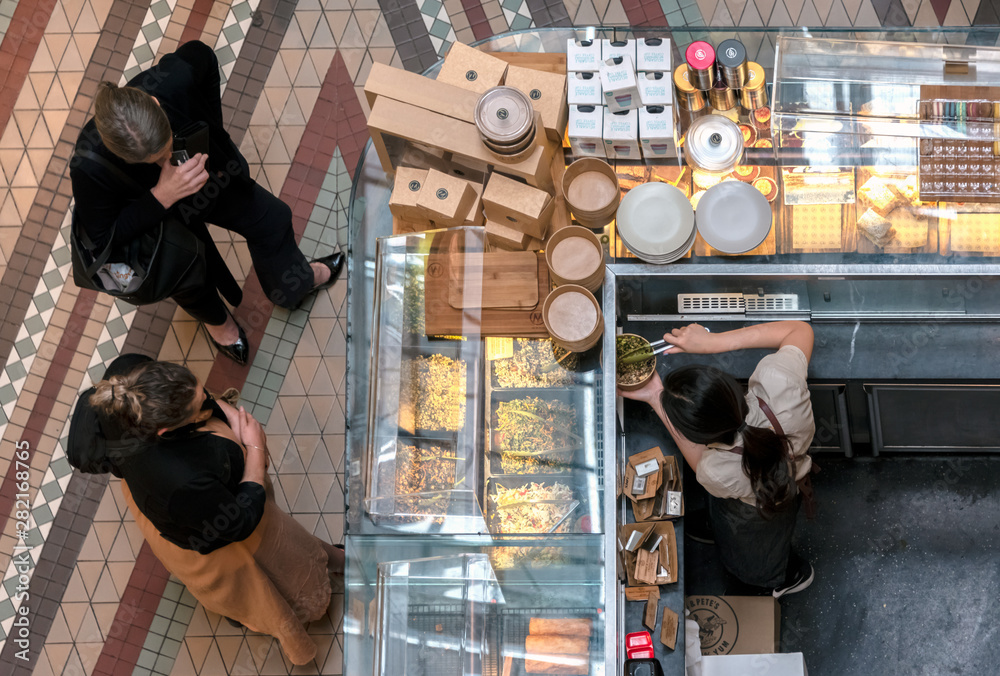 Fototapeta premium Customers selecting food at a cafe in Sydney Australia
