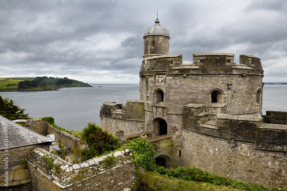 St Mawes Castle fortress looking to St Andrews Lighthouse on the coast of Carrick Roads and the Atlantic Ocean in Roseland Peninsula Cornwall England