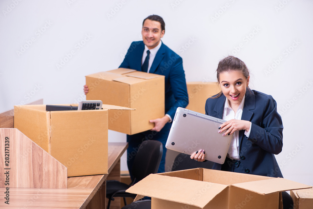 Two employees being fired from their work Two employees being fired from their work