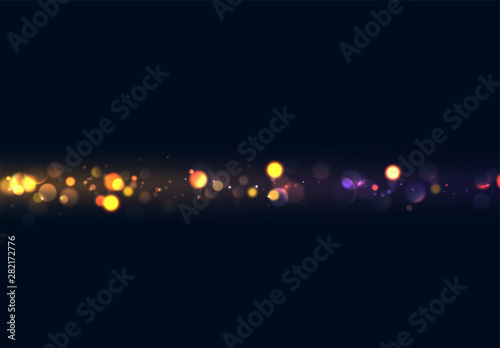 Christmas background with golden lights bokeh. Night bright gold sparkles backdrop.
