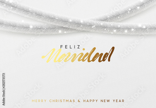 Glowing Christmas background. Spanish text Feliz Navidad. Design traditional Christmas decorations, silver tinsel, bright light garlands.