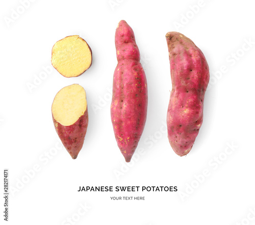 Creative layout made of sweet potato. Flat lay. Food concept. Japanese sweet potato on white background. photo