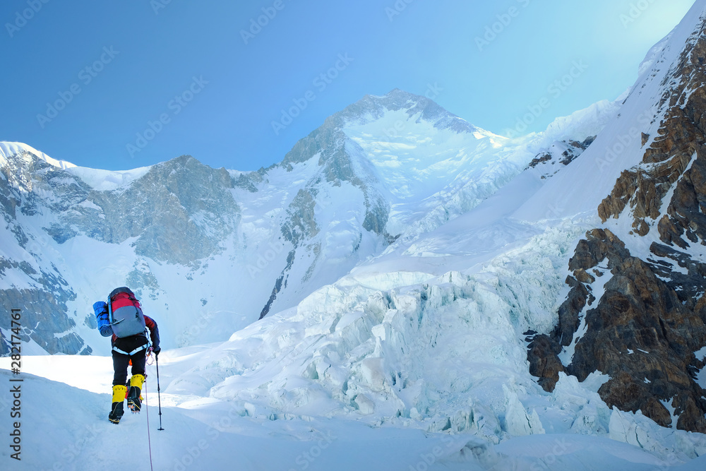 Climber reaches the summit of Everest, Nepal.