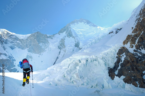 Climber reaches the summit of Everest, Nepal.