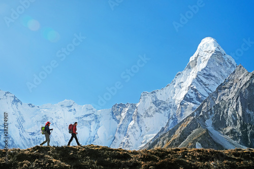Hiking in himalaya mountains. Travele hiking in the mountains, Nepal. Everest region. photo