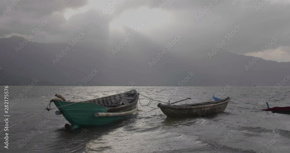 two boats floating in the water. two boats floating in the water.