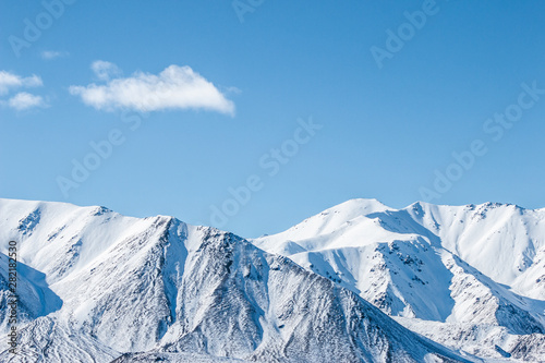 mountains in winter, snow capped peaks, mountain winter landscape