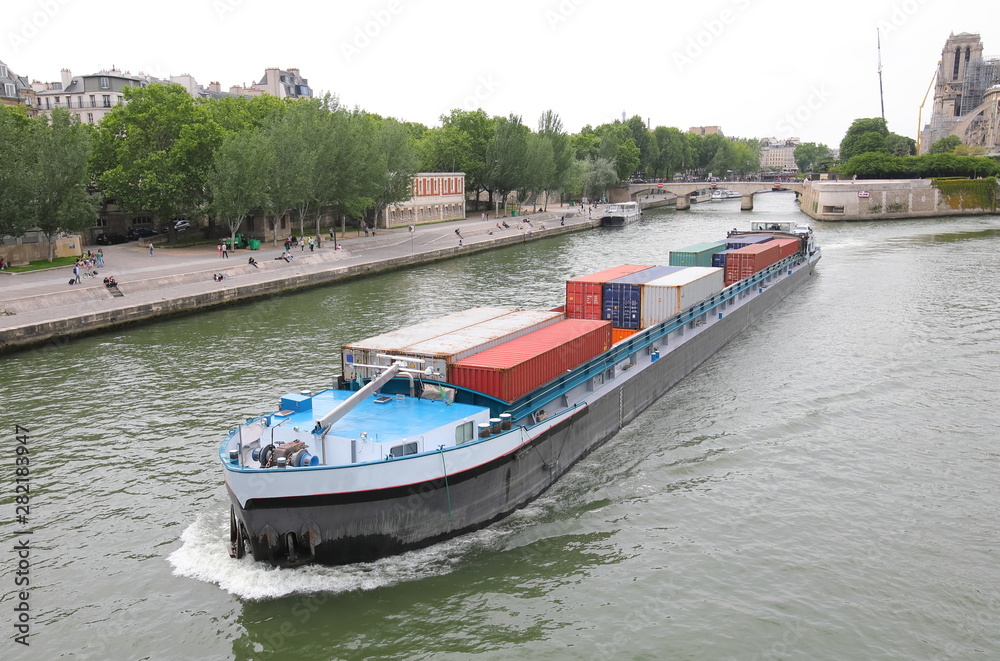 Container tanker Seine river cityscape Paris France Container tanker Seine river cityscape Paris France