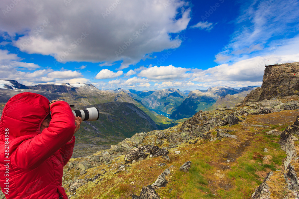 Tourist taking photo from Dalsnibba area Norway