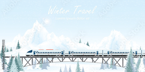 Speed train on railway bridge on winter landscape.