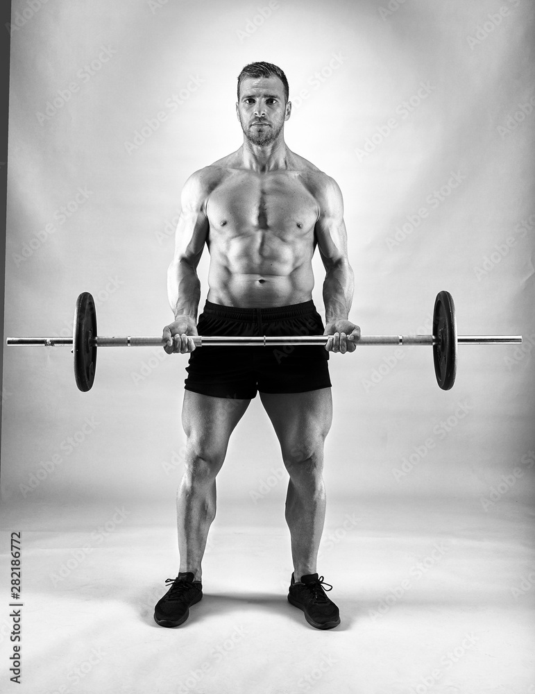 Man doing biceps curl with barbell Man doing biceps curl with barbell