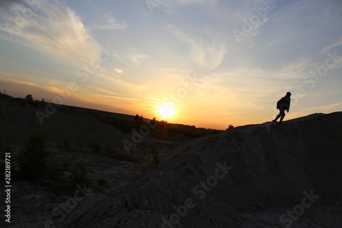 boy climbs up the mountain